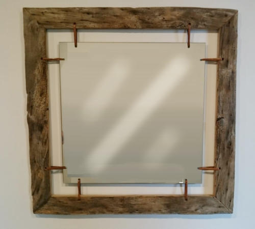 Spiegel mit Leder in Rahmen gespannt
